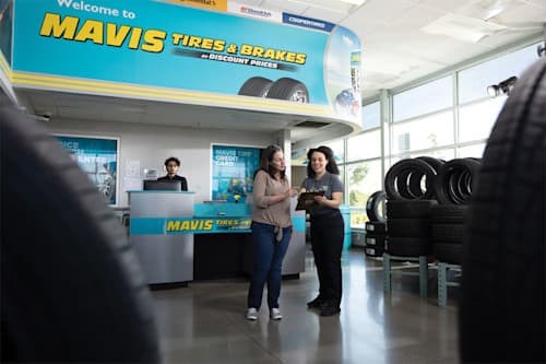 mavis employee helping customer