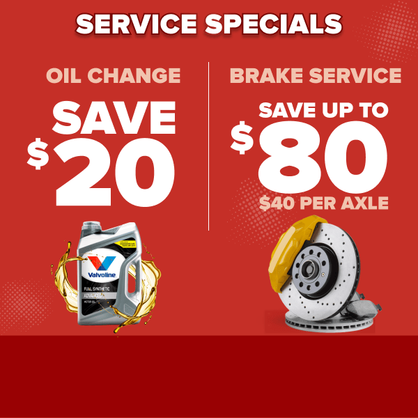Red promotional banner showing service specials: oil change save $20 with Valvoline bottle, brake service save up to $80 with rotors
